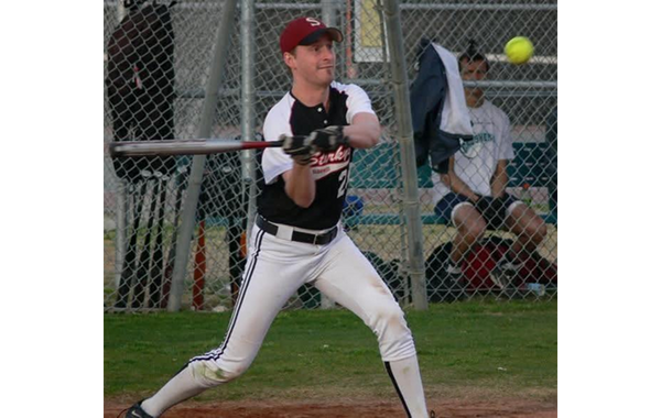 Player hitting a softball