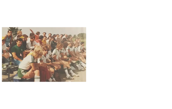Players sitting on bleachers
